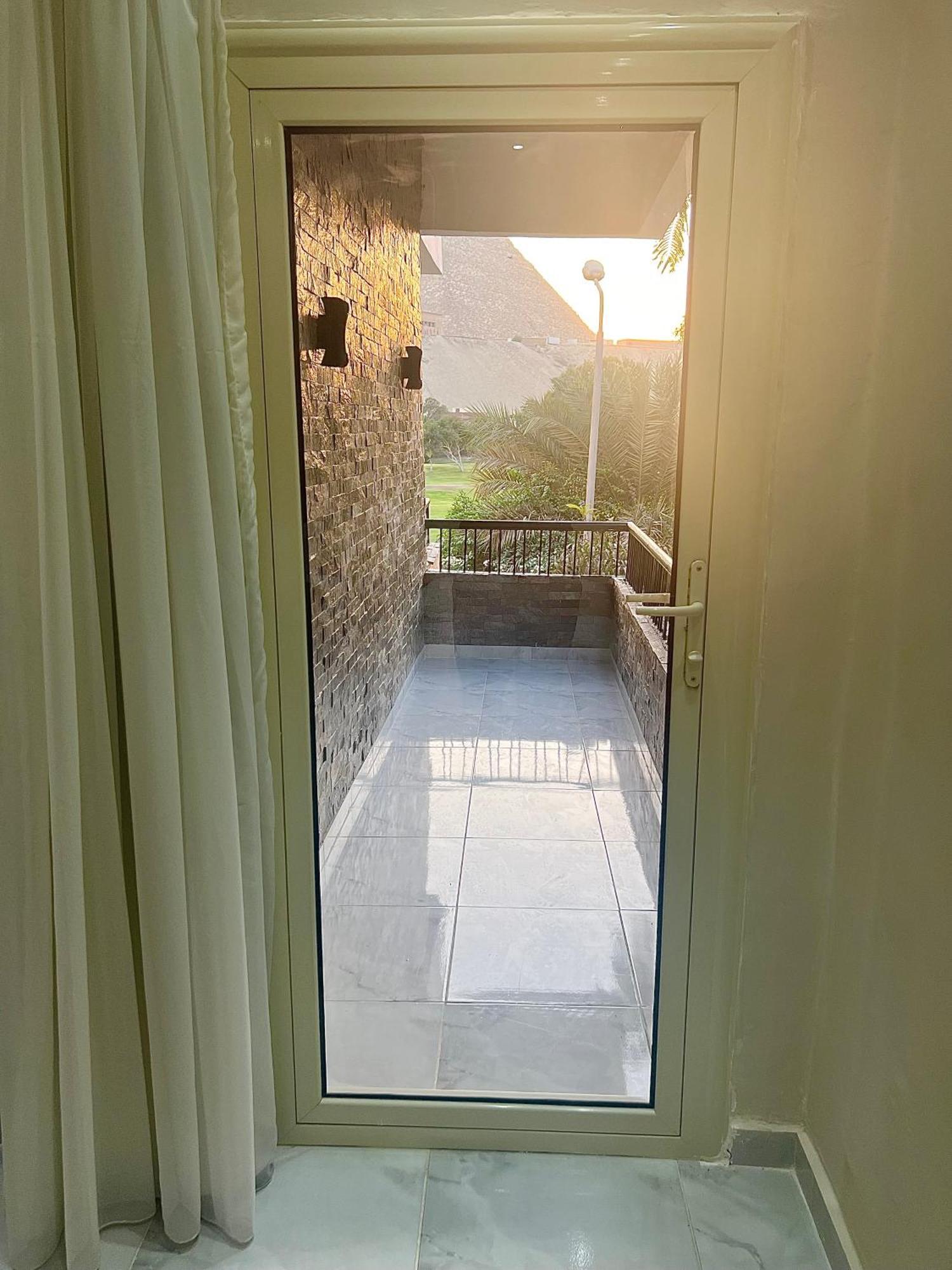 New Glamour Pyramids Hotel Kafrat al Jabal Bagian luar foto