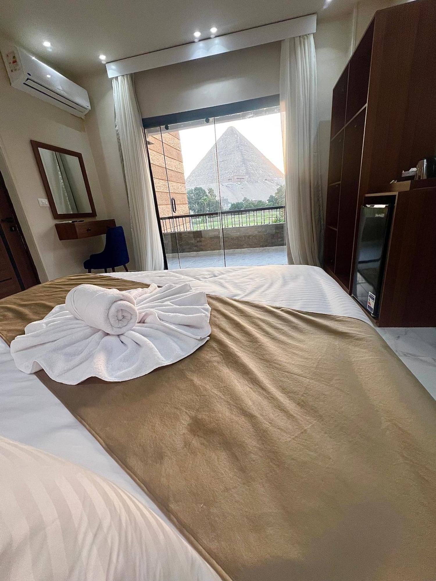 New Glamour Pyramids Hotel Kafrat al Jabal Bagian luar foto