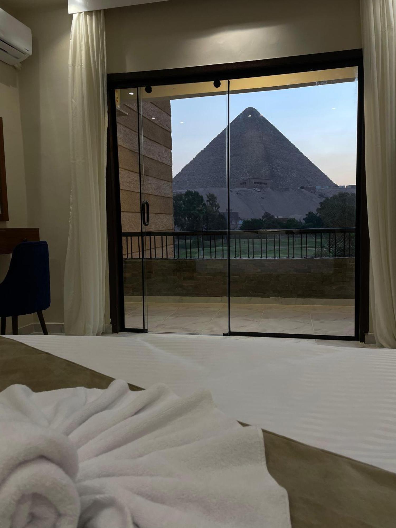 New Glamour Pyramids Hotel Kafrat al Jabal Bagian luar foto