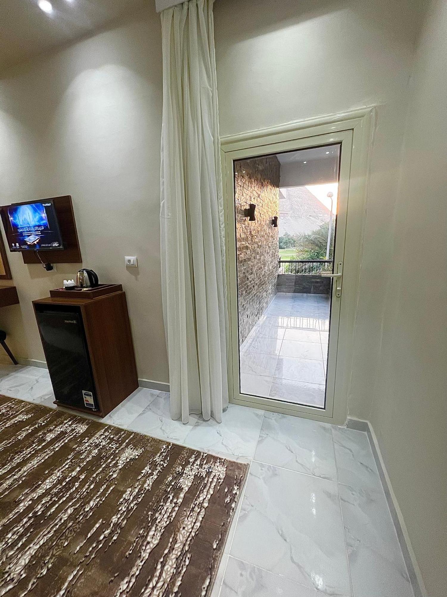 New Glamour Pyramids Hotel Kafrat al Jabal Bagian luar foto