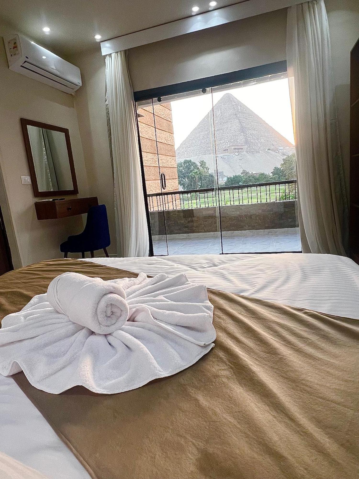New Glamour Pyramids Hotel Kafrat al Jabal Bagian luar foto