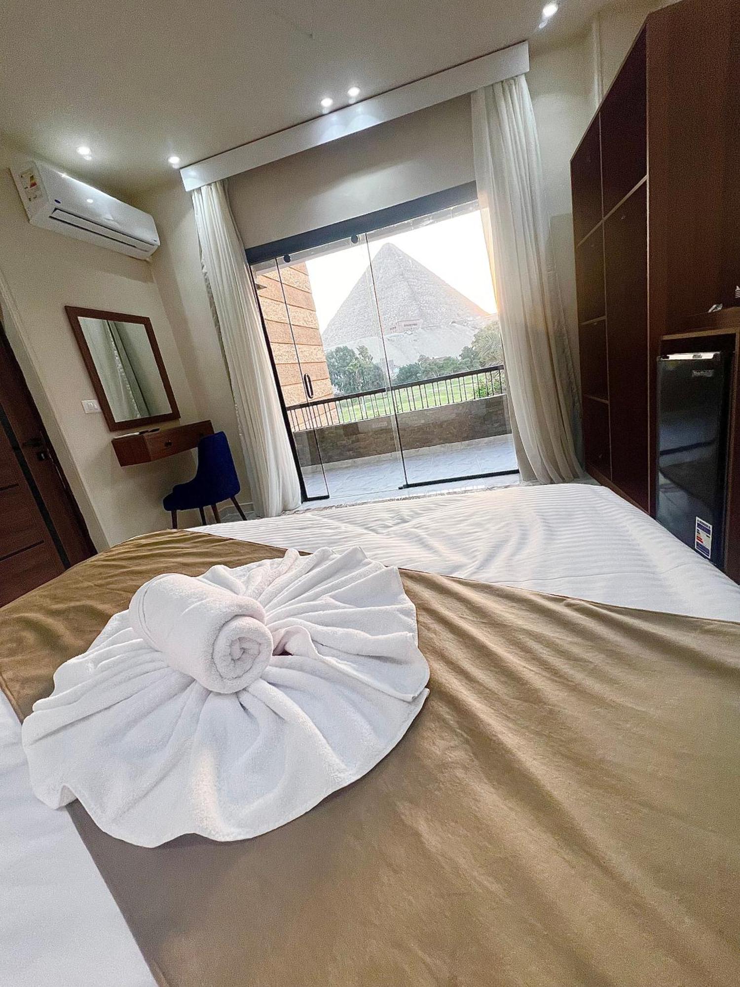 New Glamour Pyramids Hotel Kafrat al Jabal Bagian luar foto